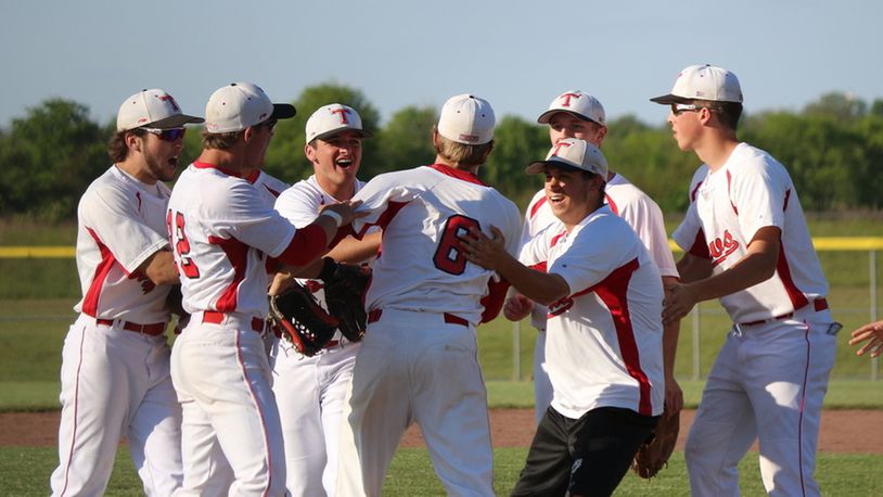 Tippecanoe’s baseball players mob then-junior Aaron Hughes (6) after his three-hit, complete-game shutout in a 1-0 defeat of Springfield Shawnee in the Division II sectional final last season. GREG BILLING/CONTRIBUTED