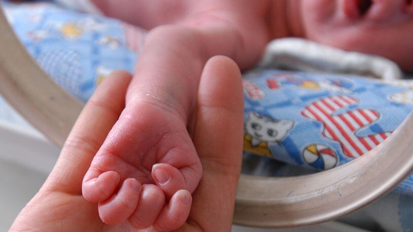 A Missouri woman gave birth to her third child in the parking lot of a fire station.