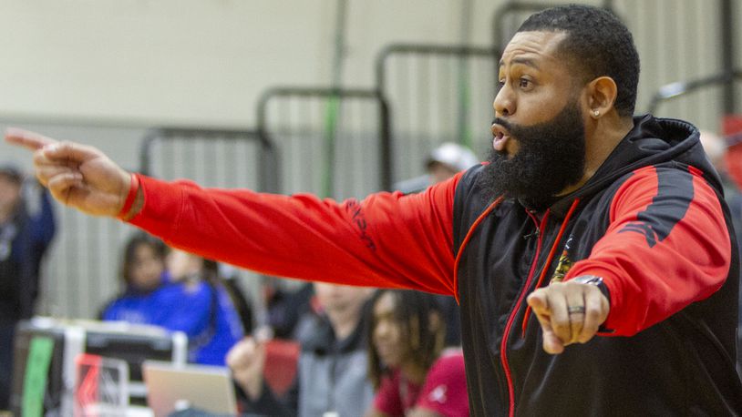 Anthony Parker is in his fifth season as the boys basketball coach at West Carrollton. He will also coach the Pirates' football team in the fall and continue as the basketball coach. CONTRIBUTED/Jeff Gilbert