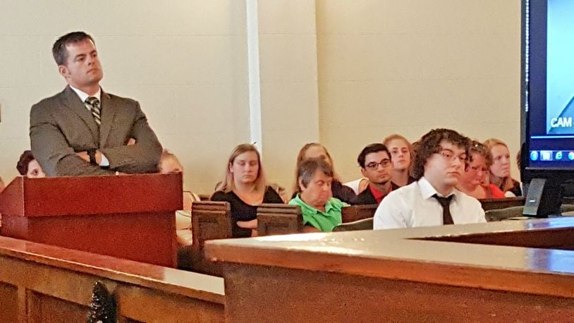 Springfield prosecutor Andrew Wilson and Tacota Fields look on as video evidence is played in court. Michael Tyler II/Staff