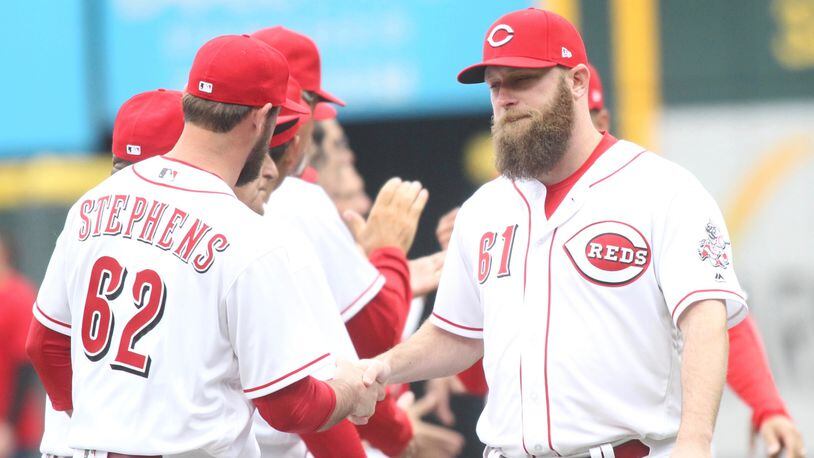 Reds reliever Kevin Quackenbush is introduced on Opening Day on March 30, 2018, before a game against the Nationals at Great American Ball Park.