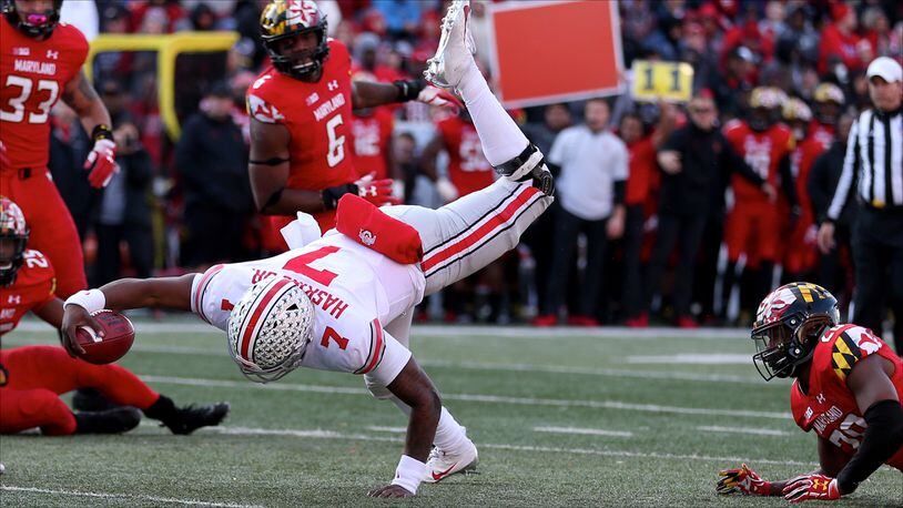 COLLEGE PARK, MD - NOVEMBER 17: Dwayne Haskins #7 of the Ohio State Buckeyes dives for a touchdown against the Maryland Terrapins during the second half at Capital One Field on November 17, 2018 in College Park, Maryland. (Photo by Will Newton/Getty Images)