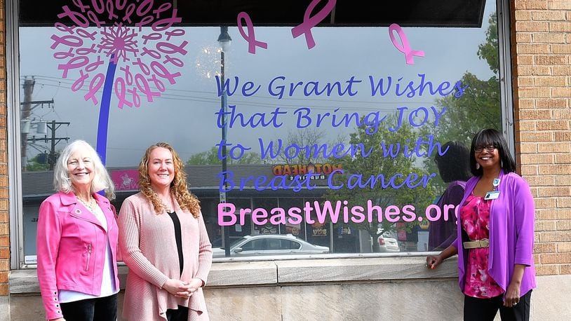 Jan Hillman (from left), Elesha Snyder and Bonnie Baker are seen outside the new offices of Breast Wishes at 115 E. National Road, Vandalia. Contributed