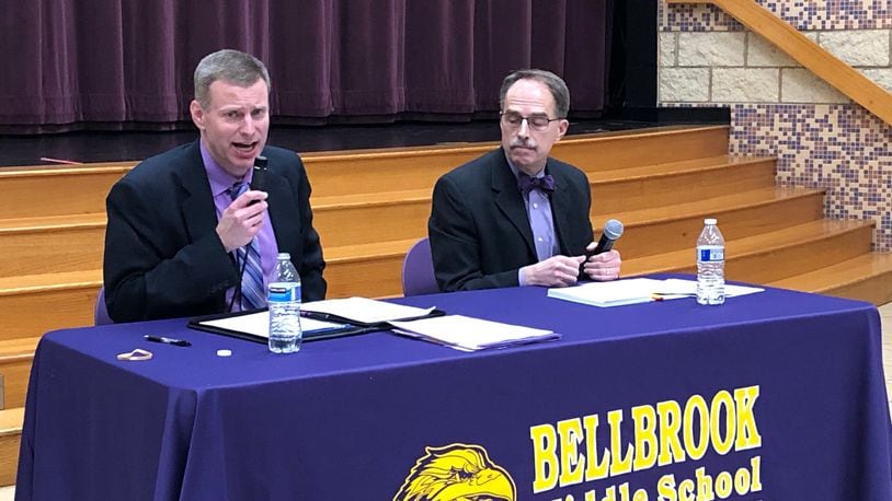 Bellbrook schools Superintendent Doug Cozad (left) and school board President David Carpenter answer residents’ school levy questions at a community meeting Monday, Feb. 3, 2020 at Bellbrook Middle School. This meeting was not among those ruled to be in violation of state law. JEREMY P. KELLEY / STAFF
