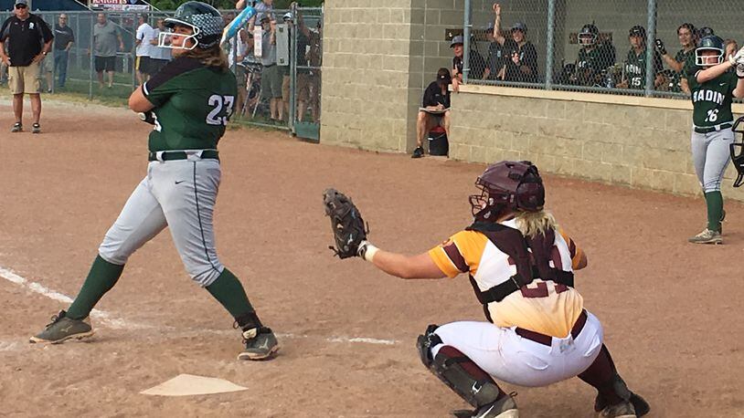 Badin’s Nicole Rawlings takes a cut in front of Ross catcher Whitley Arno during a Division II district semifinal May 15 at Kings. RICK CASSANO/STAFF