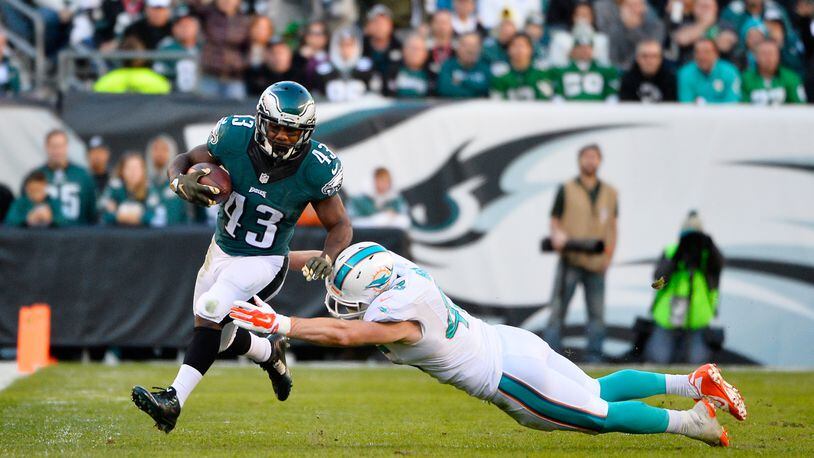 PHILADELPHIA, PA - NOVEMBER 15: Neville Hewitt #46 of the Miami Dolphins chases Darren Sproles #43 of the Philadelphia Eagles in the third quarter at Lincoln Financial Field on November 15, 2015 in Philadelphia, Pennsylvania. (Photo by Alex Goodlett/Getty Images)