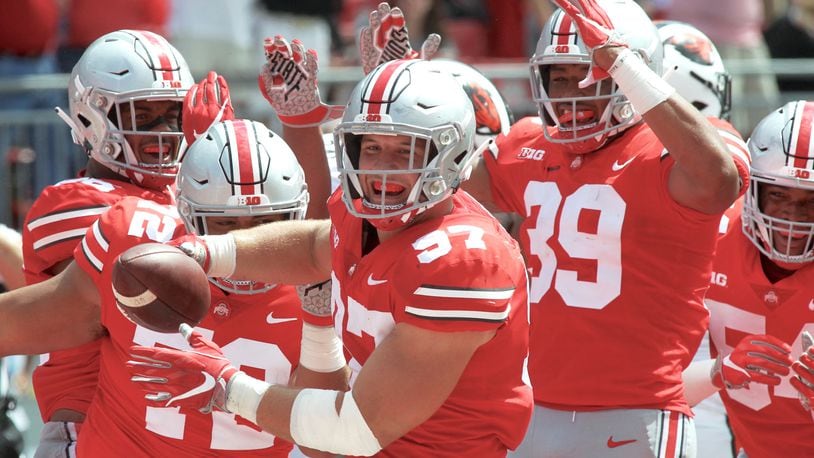Ohio State’s Nick Bosa celebrates after recovering a fumble for a touchdown against Oregon State on Saturday, Sept. 1, 2018, at Ohio Stadium in Columbus. David Jablonski/Staff