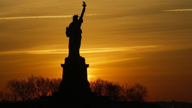 The Statue of Liberty is pictured from Liberty State Park on January 21, 2018 in Jersey City, New Jersey. The iconic landmark was closed yesterday as part of the US government shutdown now entering its second full day after coming into effect at midnight on Friday after senators failed to pass a new federal spending bill. (Photo by Eduardo Munoz Alvarez/Getty Images)