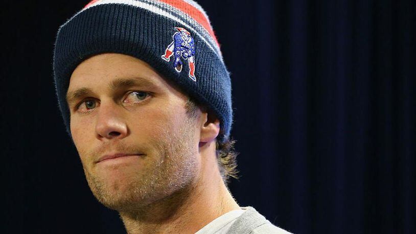Tom Brady met with the media Friday but was tight-lipped about his hand injury.