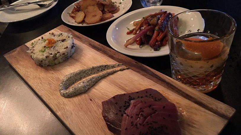 The ahi tuna entree with an old fashioned and sides of potatoes and carrots. CONTRIBUTED PHOTO BY ALEXIS LARSEN
