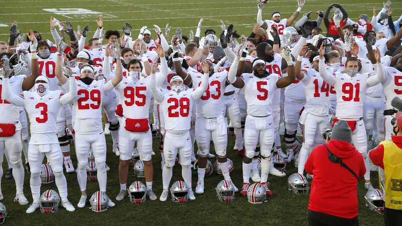 Ohio State players celebrate following an NCAA college football game against Michigan State, Saturday, Dec. 5, 2020, in East Lansing, Mich.  (AP Photo/Al Goldis)