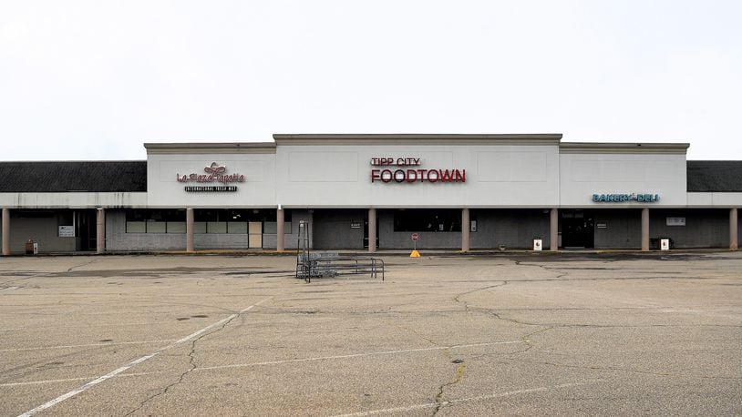 The now-closed Food Town grocery was a staple of the Tipp City Plaza. City officials are hiring a consultant to study the possible redevelopment of the plaza.