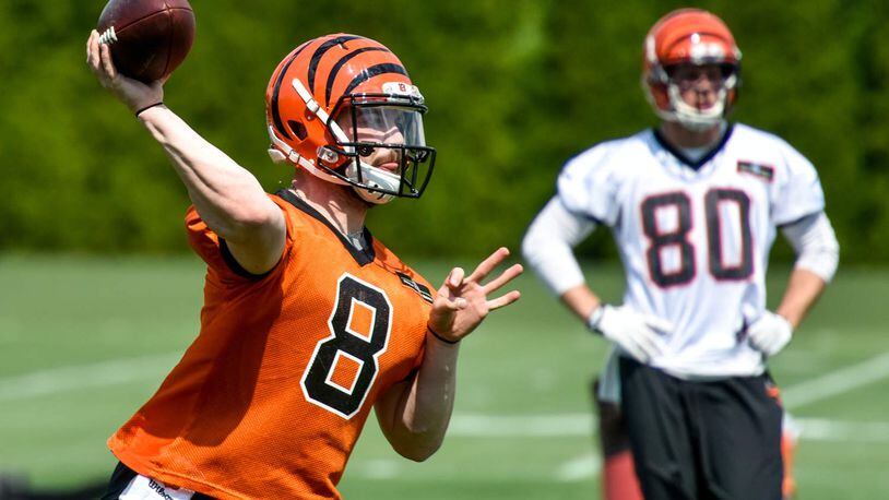 Matt Johnson throws a pass during rookie camp for the Cincinnati Bengals Friday, May 6 at the practice fields next to Paul Brown Stadium in Cincinnati. NICK GRAHAM/STAFF