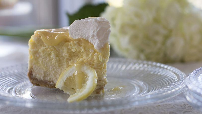 Dreamy Lemon Cheesecake has a crust made from sandwich cookies and a lemon curd topping. (Kathleen Galligan/Detroit Free Press/TNS)