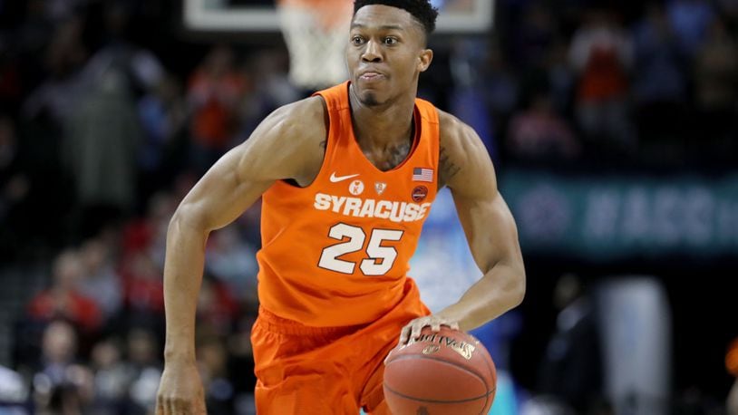 NEW YORK, NY - MARCH 07: Tyus Battle #25 of the Syracuse Orange dribbles down the court in the first half against the North Carolina Tar Heels during the second round of the ACC Men’s Basketball Tournament at Barclays Center on March 7, 2018 in New York City. (Photo by Abbie Parr/Getty Images)