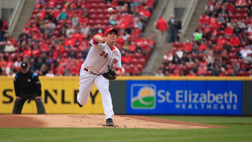 Reds starter Homer Bailey pitches against the Nationals on Friday, March 30, 2018, at Great American Ball Park in Cincinnati. David Jablonski/Staff