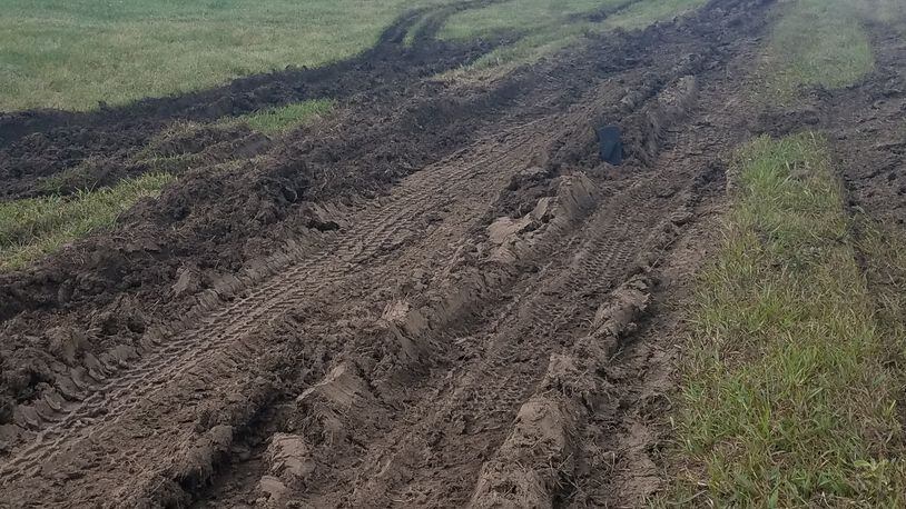 Buses used to shuttle Ohio Challenge attendees to and from the event left these ruts along a taxiway drainage ditch at Middletown Regional Airport, according to the city.