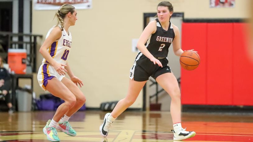 Greenon High School senior Claire Henry is guarded by Eaton's Lily Shepherd during their first round tournament game on Wednesday, Feb. 8 at Tecumseh High School in New Carlisle. The Knights won 72-64 in overtime. Michael Cooper/CONTRIBUTED