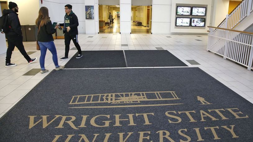 Wright State University will focus on growing enrollment and finding new revenue sources to continue avoiding financial watch. TY GREENLEES / STAFF