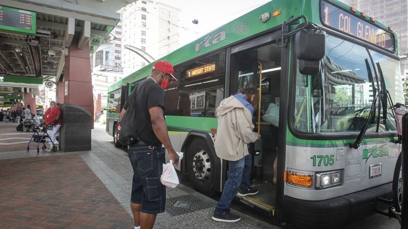 Ridership for RTA has fluctuated since the COVID-19 outbreak in March, and, right now, ridership is down 40% from 2019. Riders are shown on Thursday, Aug. 13, 2020. JIM NOEKLER/STAFF