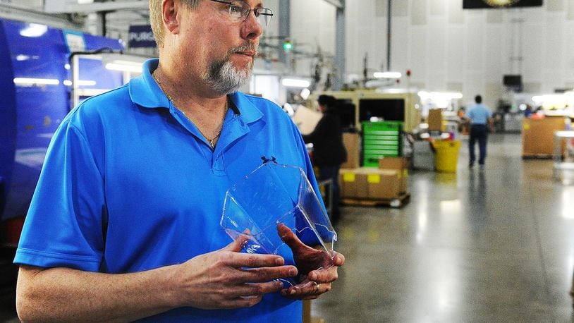 Brian O'Leary owner of on Innovative Plastic Molders, in Vandalia talks about celebrating its 20th anniversary being open. MARSHALL GORBY\STAFF