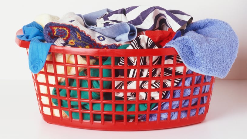 Laundry basket with dirty clothes.