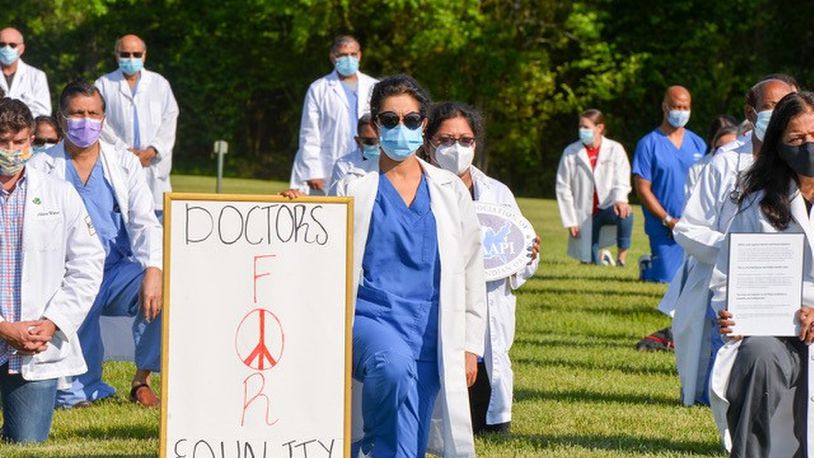 On June 6, members of Miami Valley Area Physicians of Indian Origin, other physician organizations and Wright State University knelt in silence for 8 minutes and 46 seconds at Patricia Allen Park in Springboro, Ohio in order to offer solidarity and honor the memory of George Floyd and many other victims over the years. About 150 physicians and medical students of various racist participated.