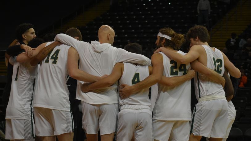 Wright State huddles before Saturday's game vs. Northwestern Ohio at the Nutter Center. Wright State Athletics photo