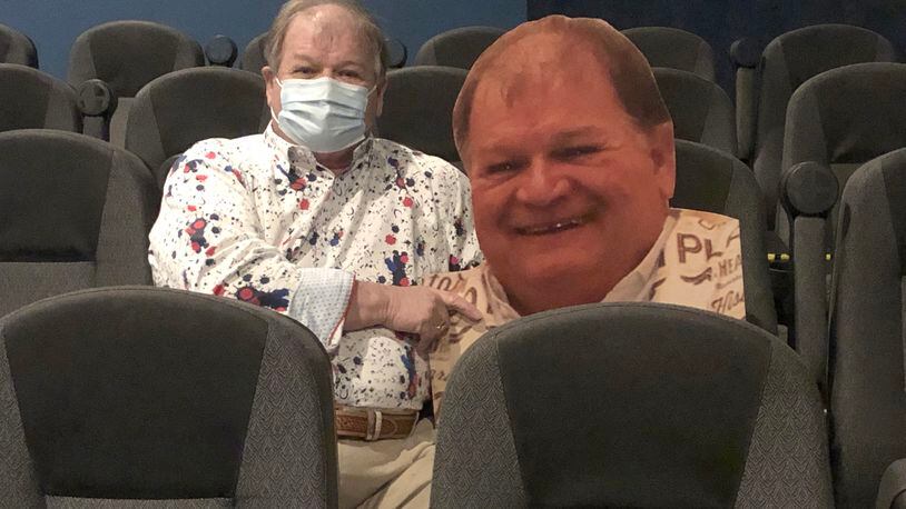 Doug Sorrell, one of the Plaza Theatre emeritus board of directors, is the first cardboard cutout that will help ensure social distancing in the Miamisburg theatre. CONTRIBUTED PHOTO