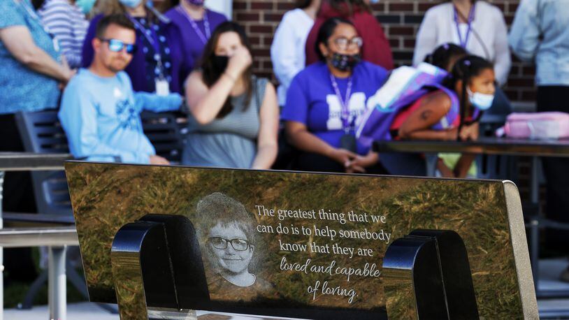 A dedication was held Thursday, Sept. 9, 2021 at Rosa Parks Elementary School in Middletown for a black granite bench in memory of James Hutchinson who was killed by his mother. Hutchinson was a student at Rosa Parks Elementary. NICK GRAHAM / STAFF
