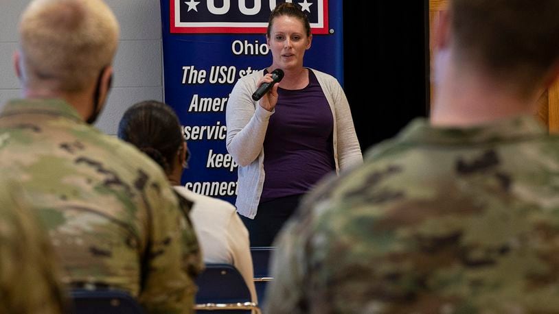 Senior Master Sgt. Jennifer Henderson, 88th Medical Group senior enlisted leader, talks about her experiences as a woman in the Air Force during the Women’s Equality Day breakfast at Wright-Patterson Air Force Base’s USO Center. Women’s Equality Day is celebrated Aug. 26 to commemorate ratification of the 19th Amendment, which granted women the right to vote. U.S. AIR FORCE PHOTO/JAIMA FOGG