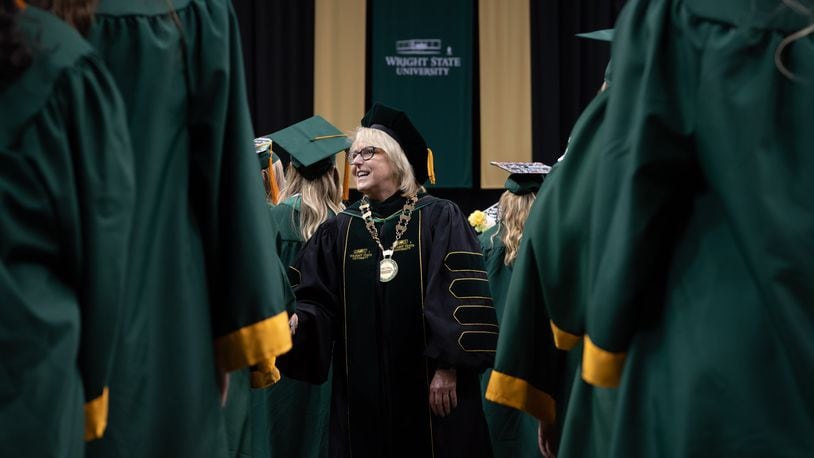 Wright State president Susan Edwards shakes hands during the Wright State University graduation ceremonies April 27-29, 2023. CONTRIBUTED/WRIGHT STATE