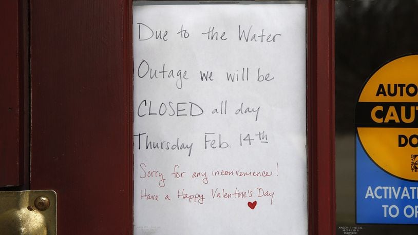 Closed sign at George’s Family Restaurant on North Dixie Drive on Thursday. A large water main break late Wednesday cut water service to much of Montgomery County and most of it was restored by Thursday morning, but continued to require boiling before use. TY GREENLEES / STAFF