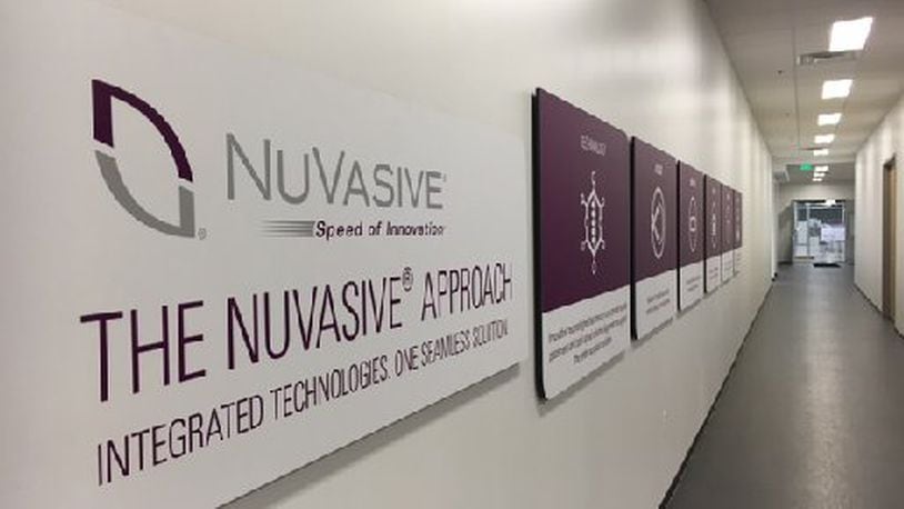 NuVasive Inc., which announced a move from Fairborn to West Carrollton in late 2015 as part of a $45 million expansion, is looking to hire for at least 30 positions for area operations. FILE PHOTO
