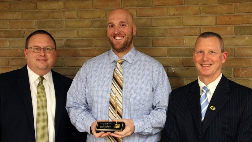 Jason Whited of Centerville is the 2019 Teacher of the Year for State Board of Education District 3. Whited (center) is pictured with Jack Durnbaugh, East Unit principal at Centerville High School (left), and Dan Tarpey, Centerville’s director of human resources.