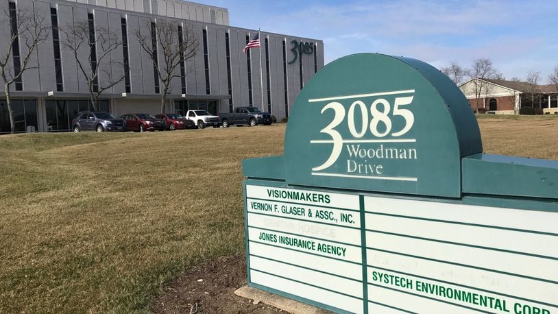 Three-story office building on Woodman drive in Kettering could be the future site of more retail after the city agreed to rezone the property for business use. Feb. 16, 2017. TREMAYNE HOGUE / STAFF