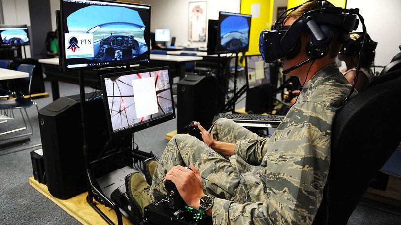 Cadet 1st Class Cade Cavanagh uses an immersive training device during a Pilot Training Next course this summer at the U.S. Air Force Academy airfield. (U.S. Air Force photo/Jennifer Spradlin)