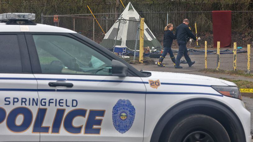 Springfield police investigate a homicide at a homeless encampment at 901 West Main Street Wednesday, April 6, 2022. BILL LACKEY/STAFF